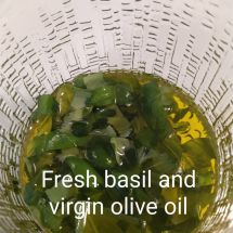 Extra virgin olive oil and fresh basil