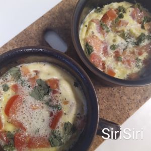 Eggs made in the microwave - tomato, basil